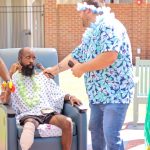 handing mic over in cmh luau